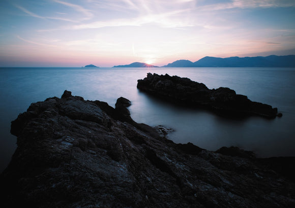 Rocky Outcrop and Pastel Skies