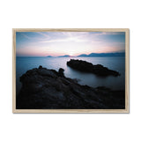 Rocky Outcrop and Pastel Skies Framed Print