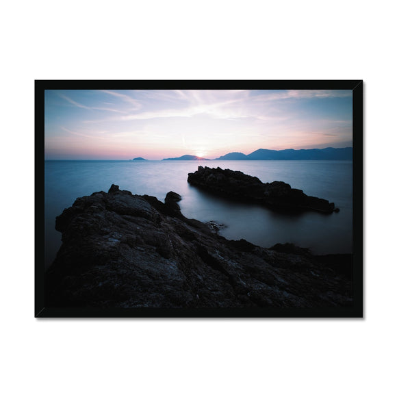 Rocky Outcrop and Pastel Skies Framed Print